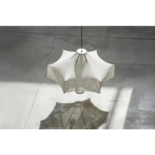 Sorpresa ceiling lamp designed by samuel wilkinson for astep the pure idea of surprise. taking a traditional wool winder...