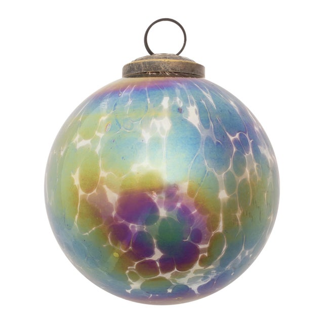 Add a touch of glamorous holiday cheer to your home with the Iridescent Glass Ball Ornaments in wintry blue and purple...
