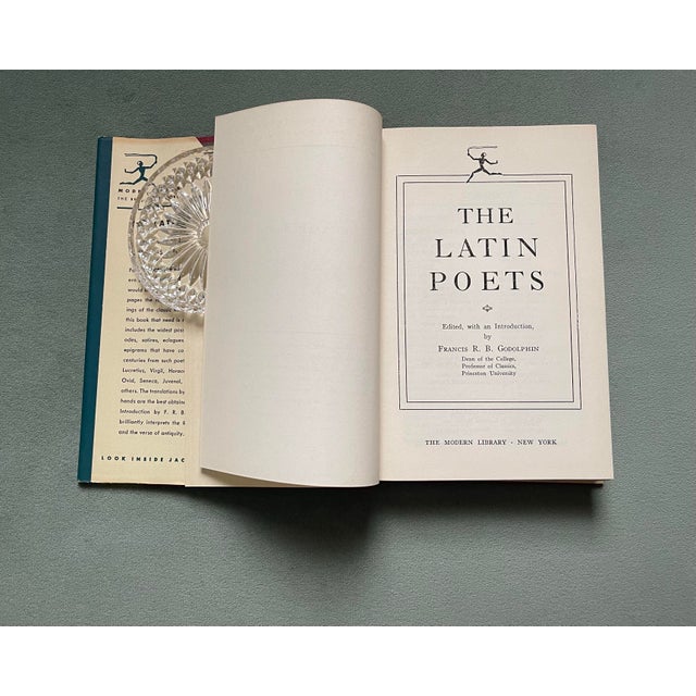 A 1949 modern library cloth-bound edition of “The Latin Poets” EDITED, WITH AN INTRODUCTION, BY FRANCIS R.B. GODOLPHIN,...