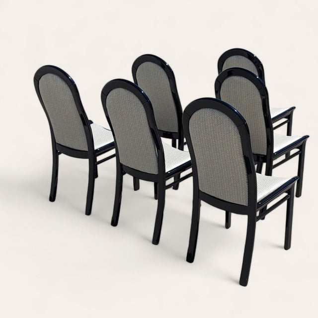 Bring timeless design into your home with this set of six Italian Postmodern dining chairs in black lacquered solid wood...