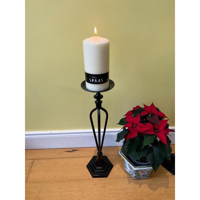 Pair of large antique cast iron candle sticks/candle stands/candle holders