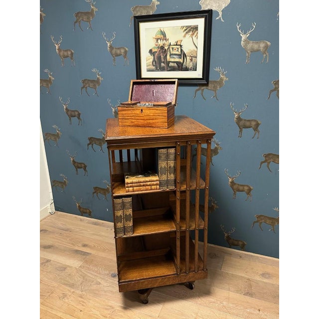 Beautiful and very solid large oak revolving bookcase in completely original and good condition. Book mill with cast iron...