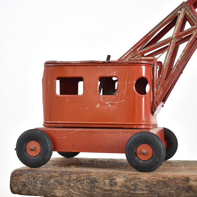 Rare Vintage Metal Toy Crane by Joustra A fabulous rare red sheet metal steel crane with grab bucket by Joustra, the...