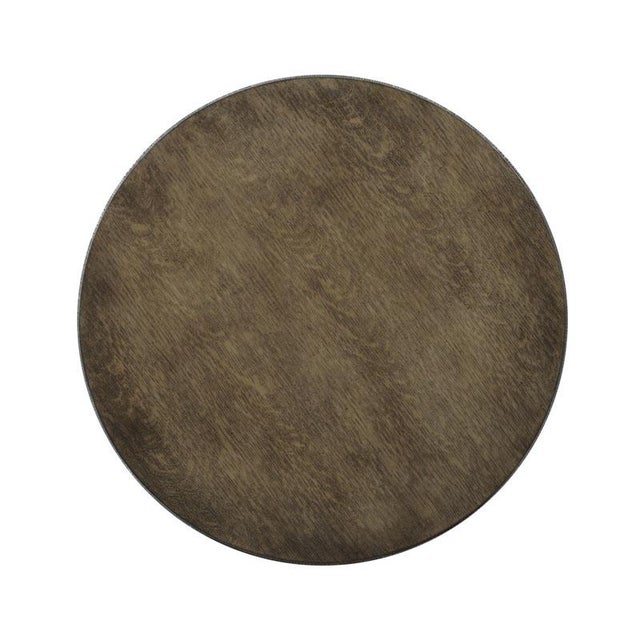 A handsome table with style hints from the metal work of French 18th Century originals. Gracefully tapering metal corner...