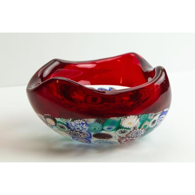 An Archimede Seguso Murano glass millefiori bowl, produced in Italy during the 1950s, combining vibrant multicoloured...