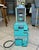 Antique 1900'S green Johnson Fare Box Co. trolley or bus fare box used to collect and count passenger fares.