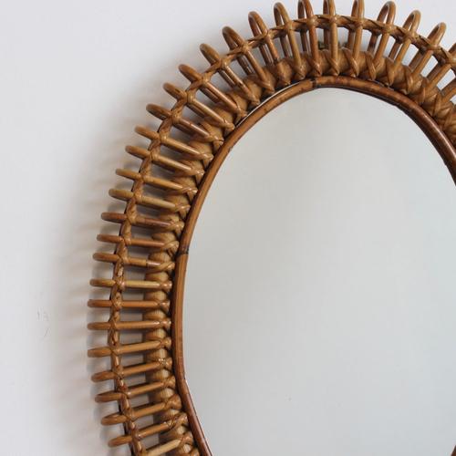 Italian rattan oval-shaped wall mirror (circa 1960s). A distinctive vintage mirror which transports you immediately to...
