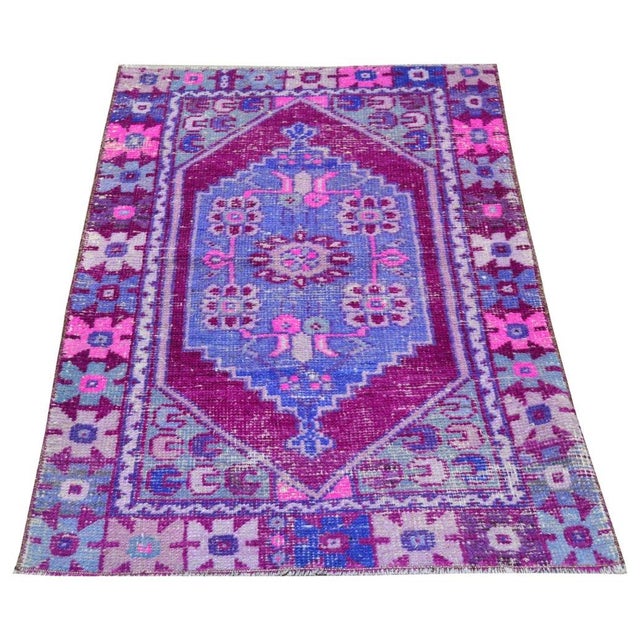 Hand-knotted with care using traditional rug-making techniques, this wool rug blends timeless craftsmanship with a modern...