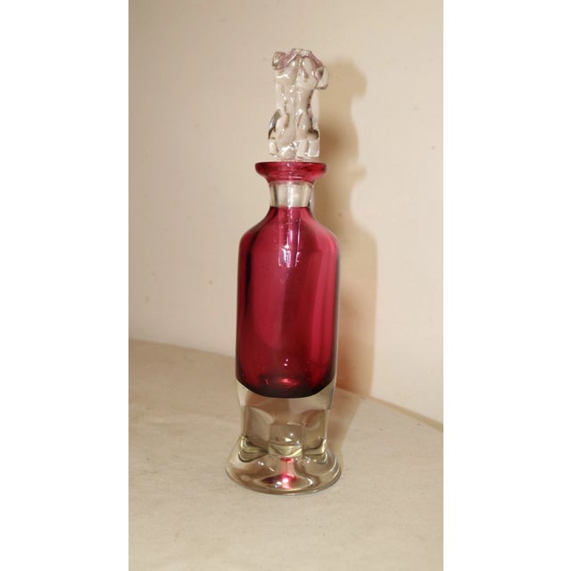 vintage hand blown Venetian glass perfume bottle. This large perfume is blown out of thick red and clean glass and is a...