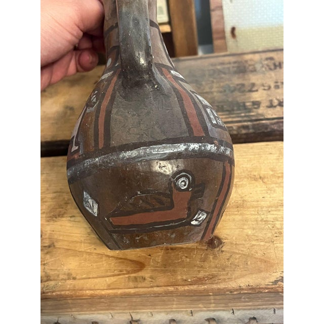 Vintage Handmade and hand painted pottery vase depicting animals throughout. Vintage condition as Pictured. Listing is for...