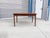 Danish modern teak extension dining table designed and manufactured by AM Møbler in Denmark during the 1960s. Showcasing...