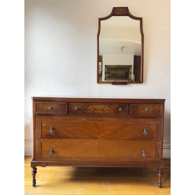 Late 19th-century American lowboy chest in the Federal / Sheraton tradition. The piece features refined neoclassical...