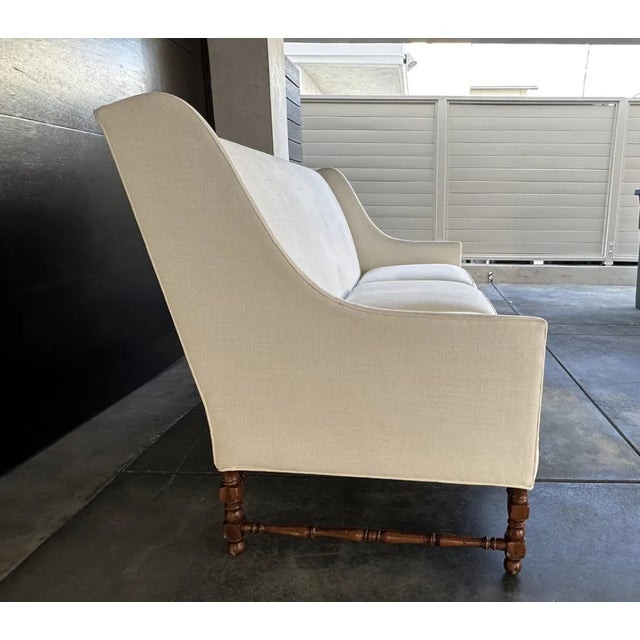 This pair of Ebanista sofas are stunning and in perfect condition. They have been recovered in Belgian linen that is soft...
