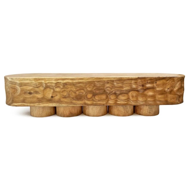 Vintage solid monkey pod wood bench with unique hand carved concave dimple texture around sides. Rounded edges and five...