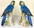 Colorful pair of large porcelain macaw parrot figures from the 1940's. The mirrored pair are beautifully detailed and hand...