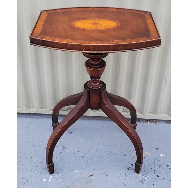 This fine inlaid side table with interesting snake legs is in fine condition.Comes to us from a private estate sale in...