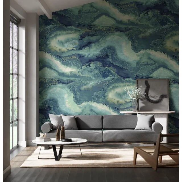 This stunning digitally printed wallpaper panel displays a highly figurative interpretation of an original ink and salt-...
