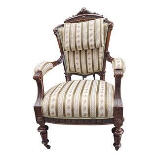 19th Century Carved Wooden Armchair with Casters For Sale