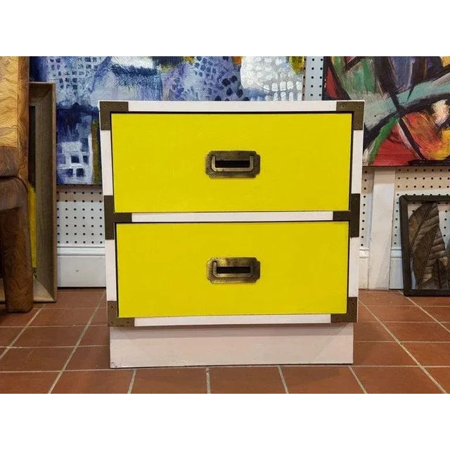 Yellow and White Campaign Colormates Nightstand attributed to Morris of California. Classic two drawer stand. Perfect for...