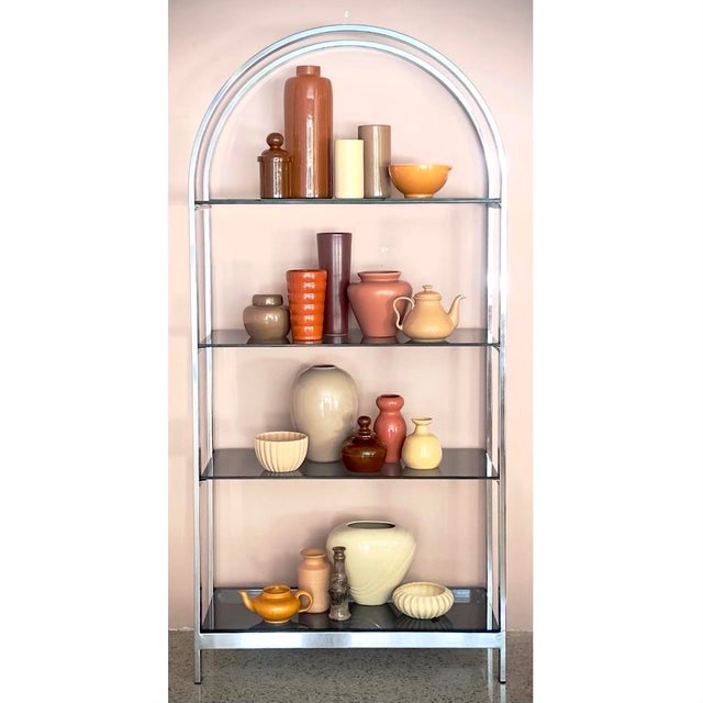 Elevate your space with this stunning, curated collection of 1980s Art Deco Revival ceramic and glass decor. Featuring a...
