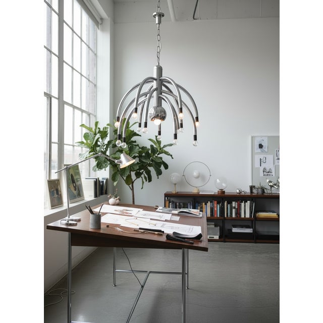 Vintage Space Age 13-Light Chrome Chandelier by Goffredo Reggiani, 1970’s 1970s Embrace the peak of Italian Space Age...