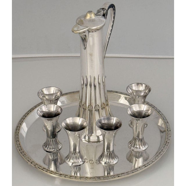A beautiful Art Nouveau drinks or schnapps set of hall-marked fine plate silver, made by the celebrated German metalworks,...