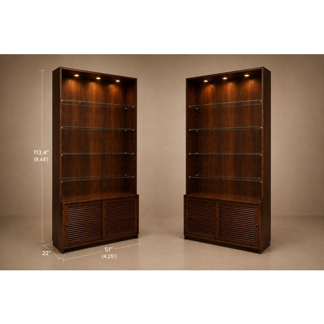This exceptional pair of contemporary bookcases is crafted from reclaimed aged Brazilian rosewood, celebrating the...