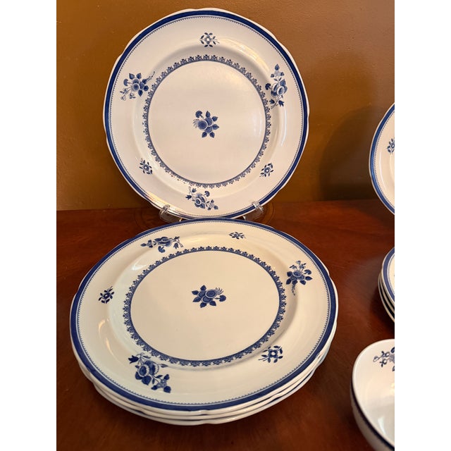 Elevate your dining experiences or expand your antique collection with this exceptional, discontinued fine stoneware set...