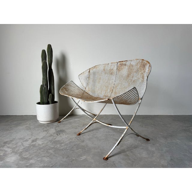 A rare 1960’s vintage “Clamshell” or “Orange Slice” outdoor settee designed by Maurizio Tempestini for John B. Salterini....