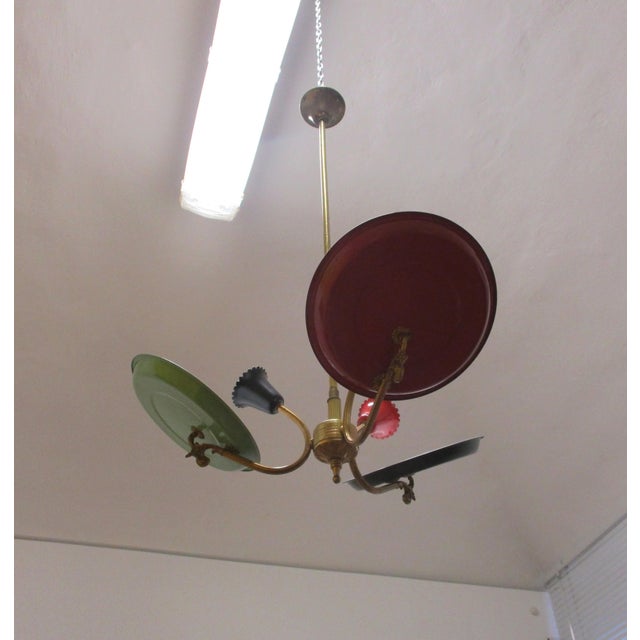 Wonderful multi-coloured three-light Italian design chandelier from the 1950s, Italian manufacture, made of brass with...