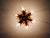Gold-tone metal ceiling light with floral decoration, produced by the italian manufacturer banci firenze, 1970s....