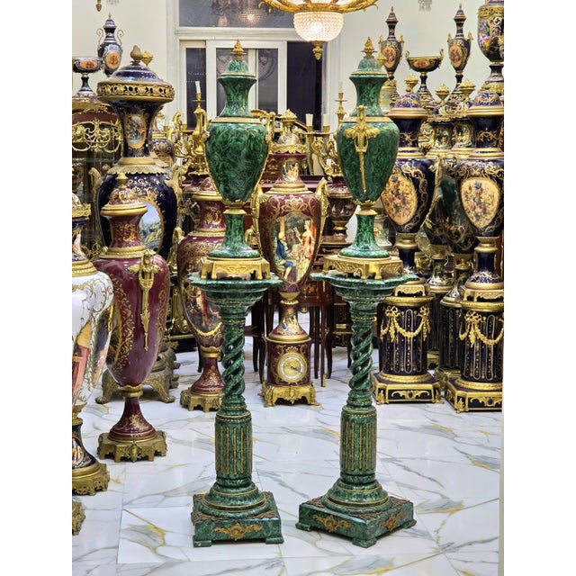 A magnificent French Empire style decorative accent featuring a luxurious malachite-inspired finish, elegant twisted...