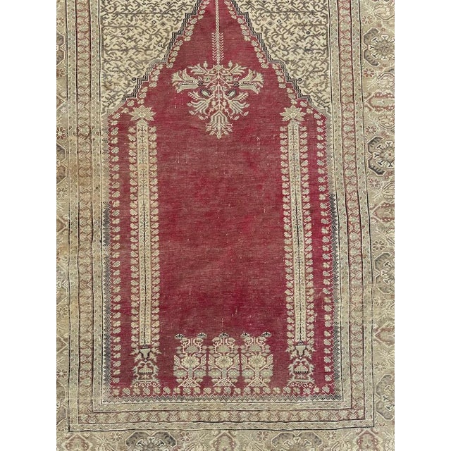 Pretty antique Turkish Ghiordes rug with beautiful mihrab design and beautiful natural light colours, entirely and finely...