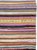 A vintage American Rag throw rug handmade during the Mid-20 century. Measures: 2' 1" x 4' 5"
