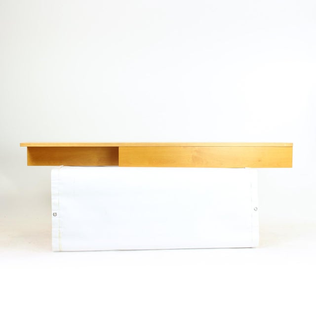 Elegant floating shelf designed and produced by UP Závody, Czechoslovakia, 1986. Retains the original label and stamp. A...