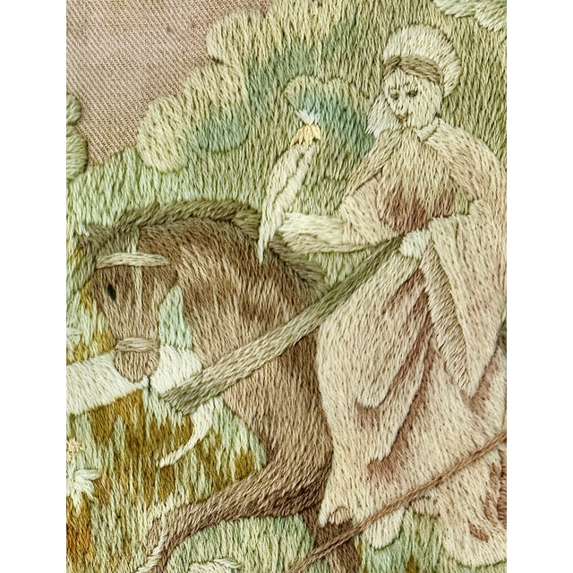 A beautifully atmospheric 19th century English woolwork embroidery featuring a horse and sidesaddle rider, hounds,...