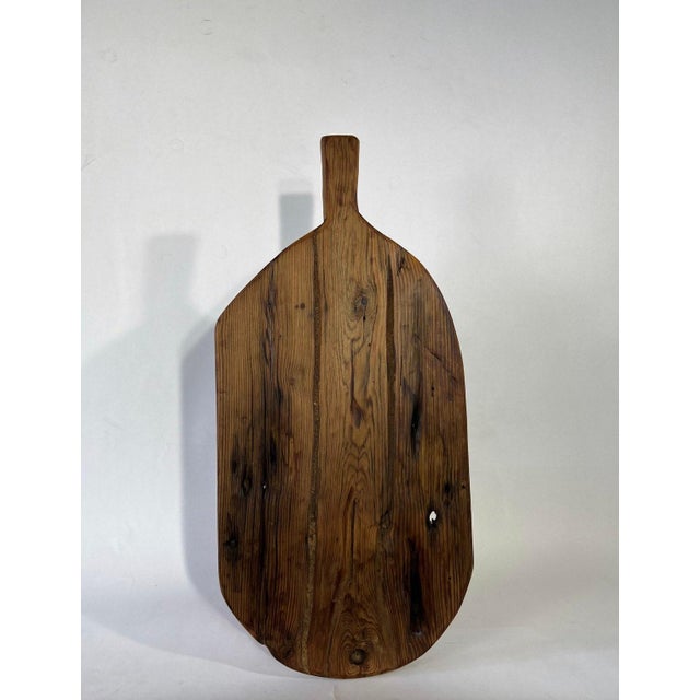 Archaic's French style breadboards are made with reclaimed century-old antique hardwood. This one is oblong, if not a bit...