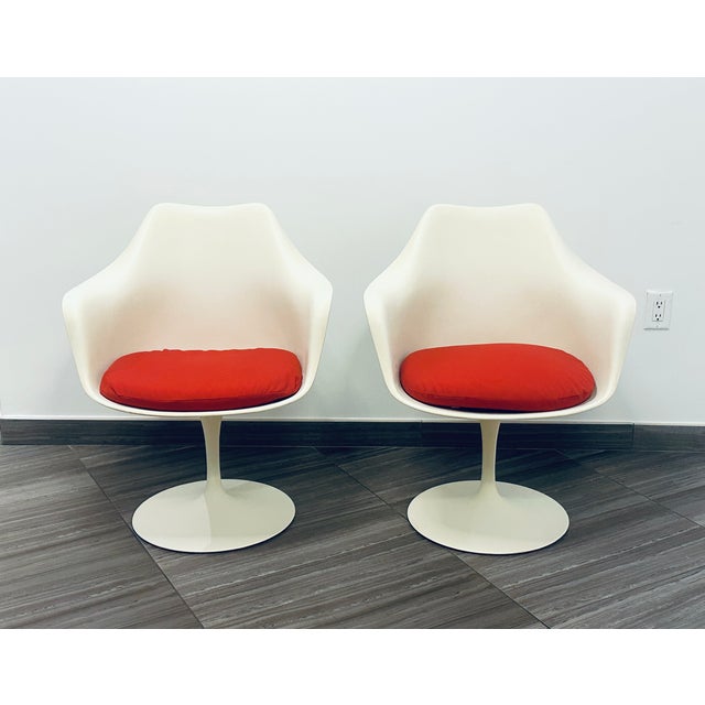 Rare early pair of Eero Saarinen Tulip Pedestal Swivel Armchairs Model 150A, designed by Eero Saarinen for Knoll in 1956....