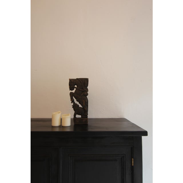 A beautiful Indian wood carving depicting a rider on horseback and a kneeling elephant. Probably second half of the 19th...