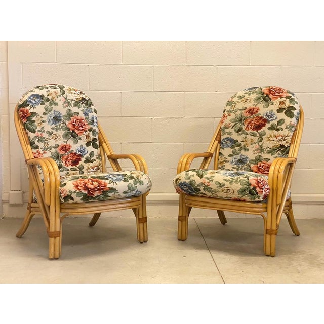Pair of 80s armchairs in bamboo with leather bindings, the height at the seat is calculated with the cushion.