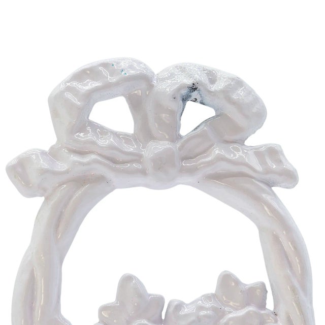 An elegant echo of early 20th-century craftsmanship, this cast iron doorstop recalls the romantic detailing of Hubley’s...