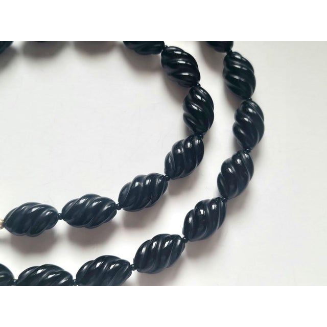 The length of the necklace is 21.5 inches (54.5 cm). The size of the fluted twist beads is 12 x 18 mm. The fluted twist...