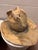 This carved wood cowboy hat came out of a prominent estate in East Cleveland. The artist name, shown in picture, is...