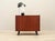 The cabinet was made in the 1970s, Danish production. The structure is covered with teak veneer. The legs are made of...