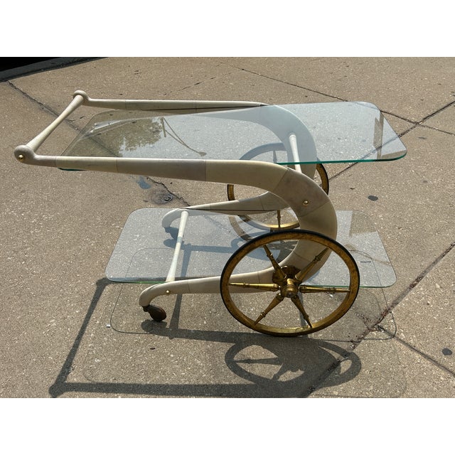 You are viewing an incredible Italian Bar Cart, designed by Aldo Tura c 1960s. The design features an elegant chariot-...