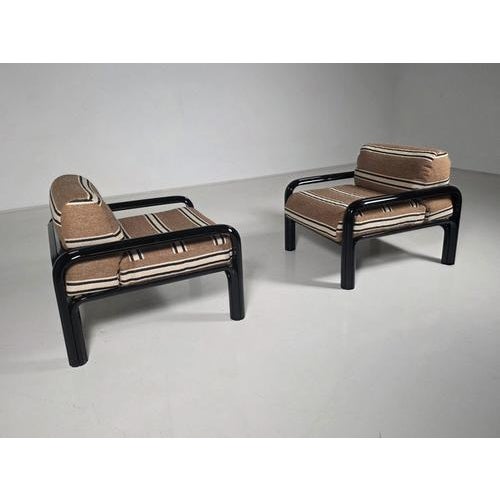 Pair of Model 54 lounge chairs designed by Gae Aulenti for Knoll International in 1975. These chairs perfectly capture...