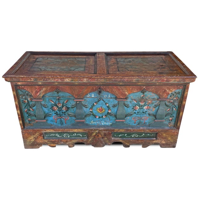 Painted chest dated 1801, decorated with floral motifs, typical of the Alpine tradition of 19th-century Central Europe....