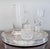 Elegant silverplate tray with button feet and graceful reticulated gallery and an intricately engraved base. Marked...