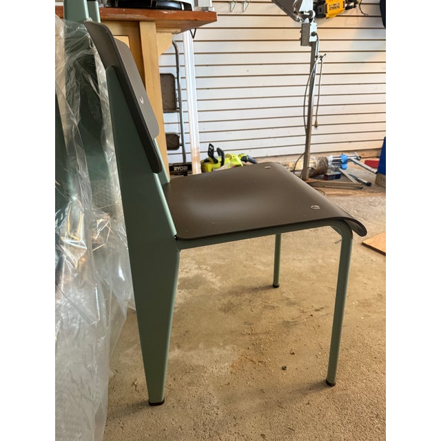 Set of 8 authentic Vitra Standard SP chairs designed by Jean Prouvé. These chairs were purchased new and removed from...
