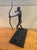 Beautiful bronze sculpture of an archer pulling on an arrow sits on a marble base. great Deco style. Our purpose at 50s...